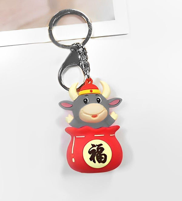 Cow in a Money Bag keychain - TinyTikes.pk
